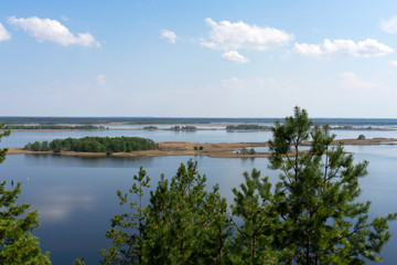 Fototapeta na wymiar Landscape of Dnieper river with islands covered by fores in Vitachiv, Ukraine 
