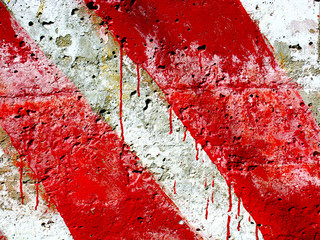 Red diagonal lines on the barrier for background. Close up.