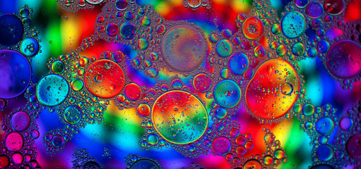 colorful patterns of oil in water