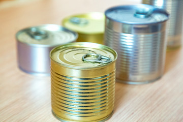 a tin can,an iron can, is on the table