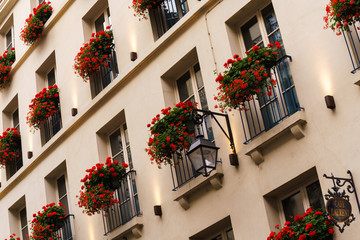 Fototapeta na wymiar Flowered Balconies