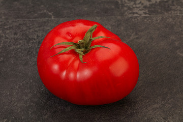 Ripe tasty red big tomato
