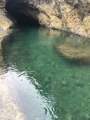 岩場の洞窟　a cave in shore, sea 
