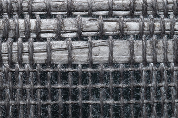 Braided fibers close up. woven texture. wicker background. knitted surface. weaving pattern. weaving from threads