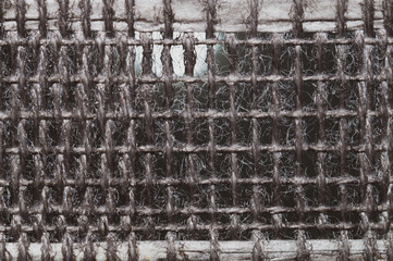 Braided fibers close up. woven texture. wicker background. knitted surface. weaving pattern. weaving from threads