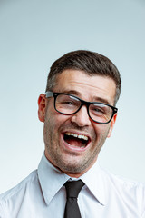 Front portrait of laughing businessman
