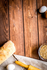 Dried crumbs with bread on kitchen table background top view mokeup