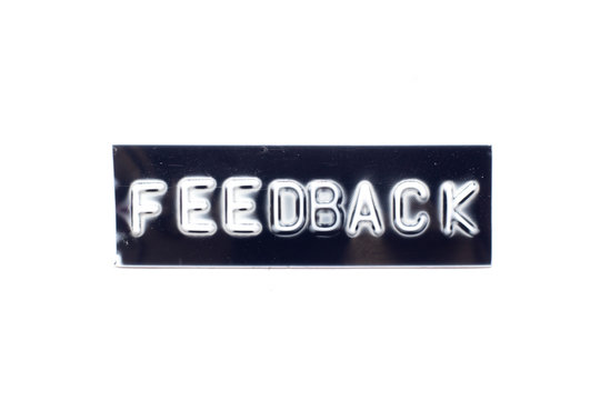Embossed letter in word feedback in black banner on white background