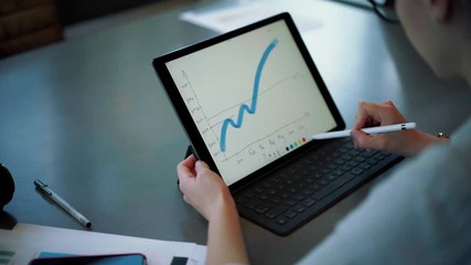 Skilled female economist working remotely with statistic data information connected to 4g wireless for creating line chart via financial application, concept of professionalism and accounting process
- Powered by Adobe