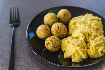 plant-based food, vegan chickpea falafels and polenta