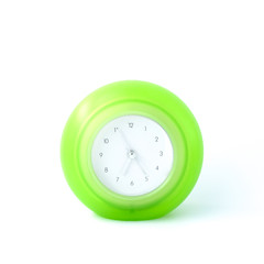 green alarm clock isolated on white background