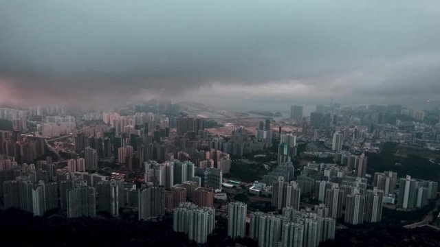 Time lapse shot view of cityscape seen from above the Lion Rock Peak in Hong Kong, China, in morning time