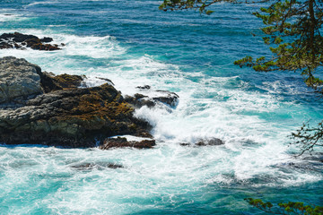 Beautiful seascape. Turquoise colored ocean, and rocky cliffs.  Big Sur, Monterey County, California