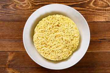 top view raw instant noodles in a bowl