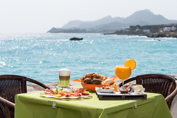 Salty and sweet brunch in front of the sea