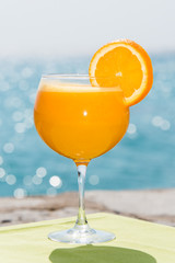 Orange juice by of the sea
