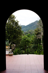 Looking out from a chapel at the entrance to the botanical garden.
