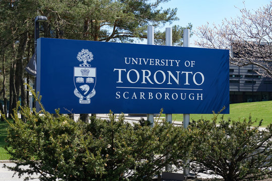 Sign At The Entrance To The Suburban Scarborough Campus Of The University Of Toronto Is Perched On A Hillside Above A Wilderness Area.