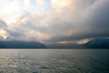 The dense morning fog over the emerald green lake. , Khao Sok National Park ,Thailand