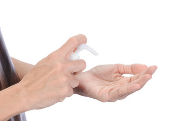 Protection Coronavirus and Bacteria through touch concept. Close up view of woman using alcohol gel (antibacterial hand sanitizer) on hand for protect and clean from virus or germ on white background.