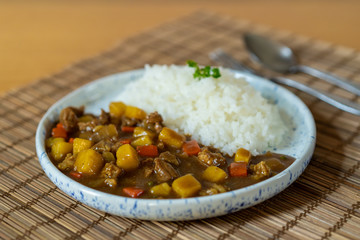Japanese beef curry served with Japanese Rice close up. Traditional popular food of Japan.