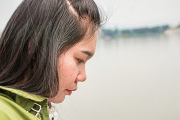 Coles up An Asian woman in Thailand is pictured on the side