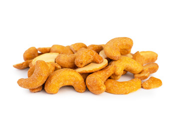 Roasted cashew nuts on white background. (clipping path)