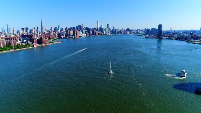 A View of NYC and the Boats in the East River