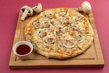 pizza close-up, isolated, against a colored background. whole pizza 