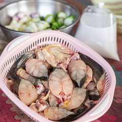 a basket full of fresh fish fillets