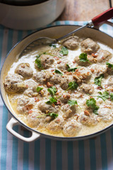 Pork meatballs with almonds in mustard cream sauce 