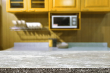 Wood desk space and blurred of kitchen background. for product display montage. business presentation.