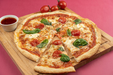 pizza close-up, isolated, against a colored background. whole pizza 