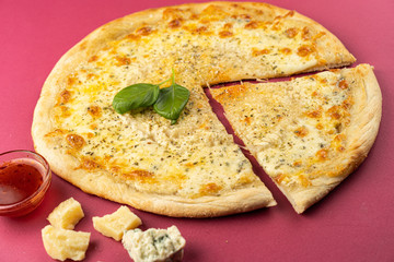 pizza close-up, isolated, against a colored background. whole pizza 