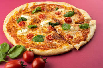 pizza close-up, isolated, against a colored background. whole pizza 