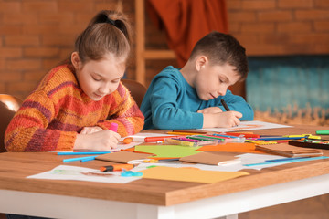 Cute children drawing at school