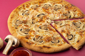 pizza close-up, isolated, against a colored background. whole pizza 