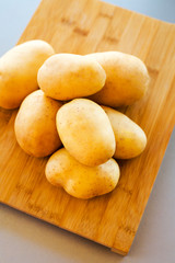 close up potatoes on kitchen table