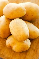 close up potatoes on kitchen table