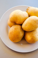 close up potatoes on kitchen table