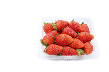  Fresh strawberries placed on a white background.
