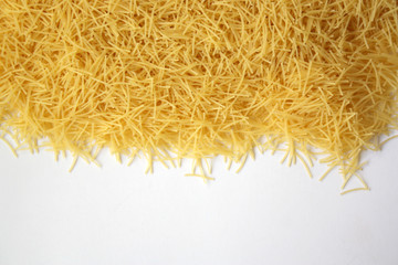Thin vermicelli close-up. Concept - pasta as background.