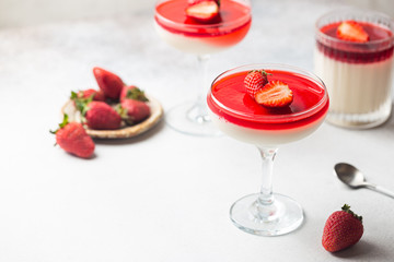 Italian panna cotta dessert with strawberry sirup and mint leaf