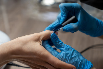 professional gamblet processing of nails by a manicurist