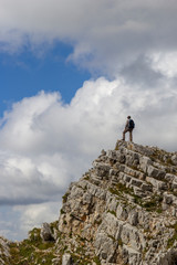 hiker on the top of a mountain aurunci