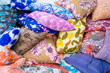 Fototapeta na wymiar multicolor pillows cushions pattern variety 