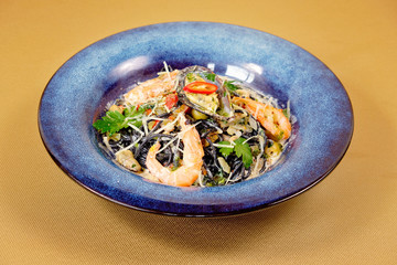 Cuttlefish black pasta with seafood and ink