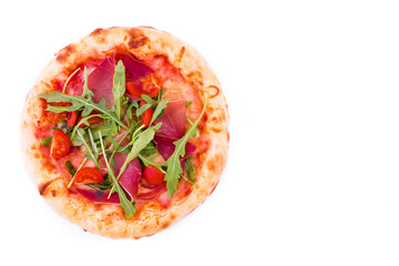 Pizza with ham, tomatoes, arugula and mushrooms on a white background.