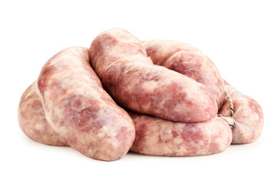 Raw meat sausages on a white background. Isolated