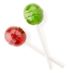 Red and green lollipop on a white background isolated. The view from top